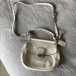 Coach Cream Crossbody Bag with Flap Closure and Adjustable Strap